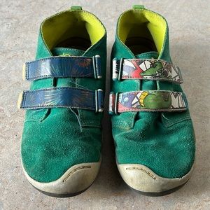 Plae green suede high tops